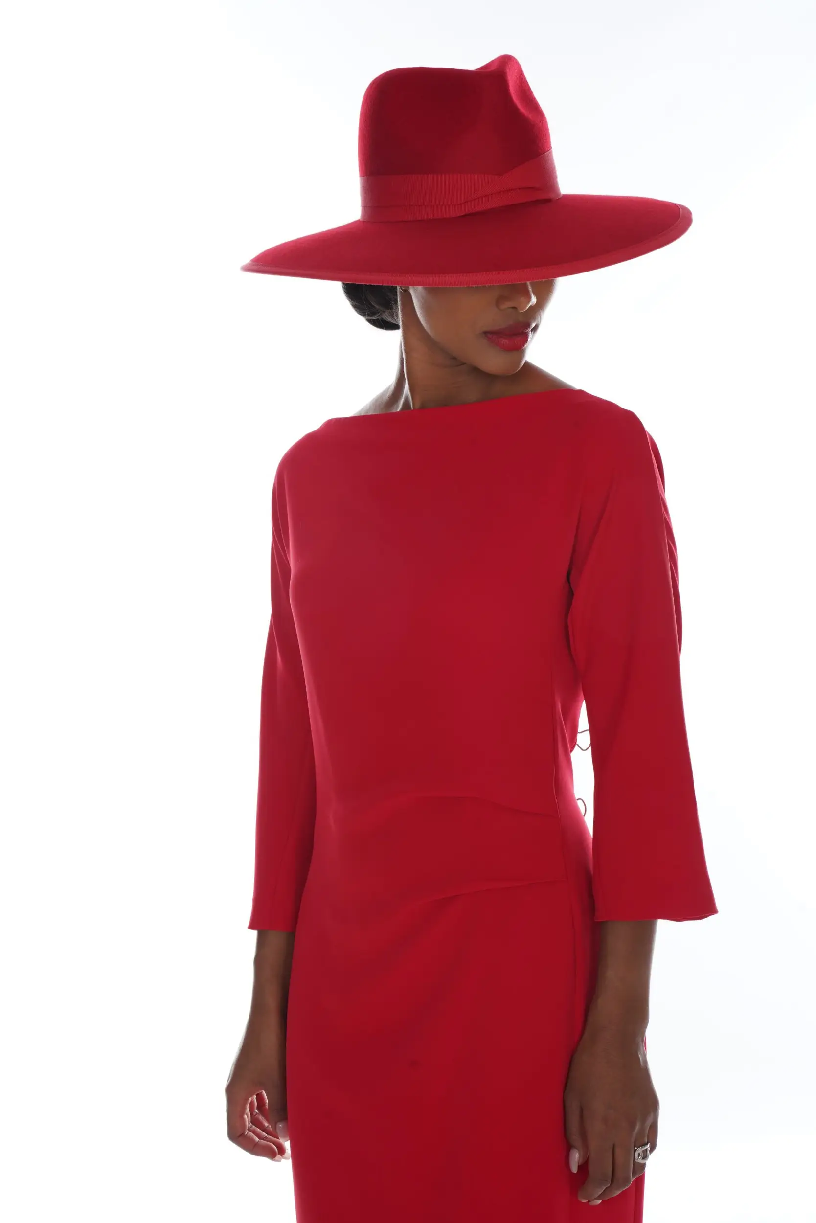 Mannequin wearing the red felt Felicia cloche hat