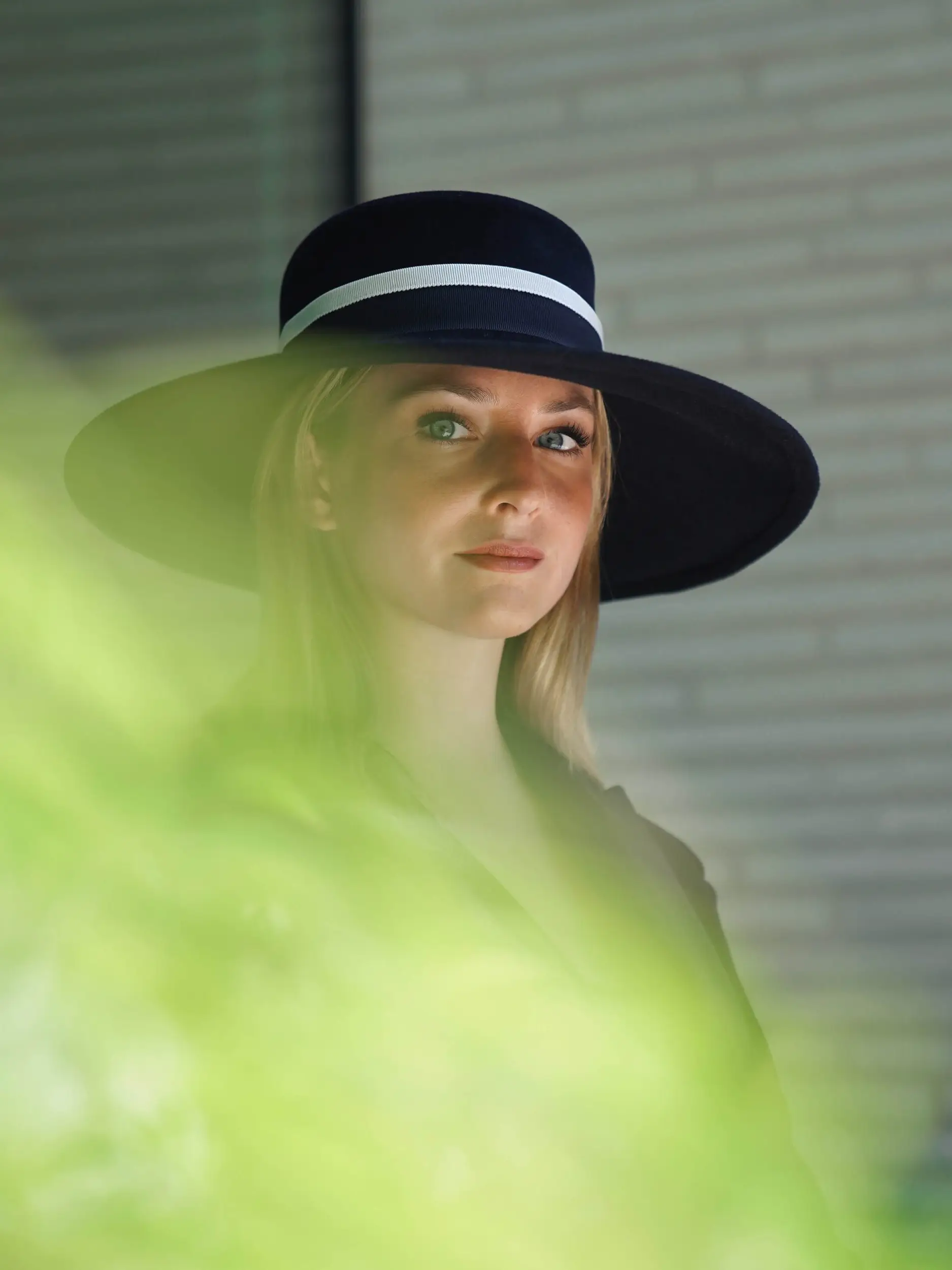 Woman wearing the winter capeline hat of the Hepburn canoe