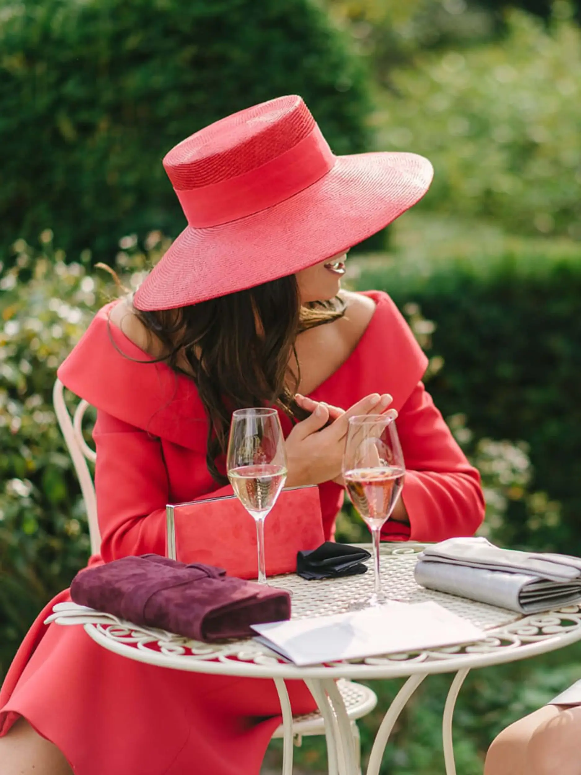 Woman wearing the Hepburn boating cap in the wedding ceremony