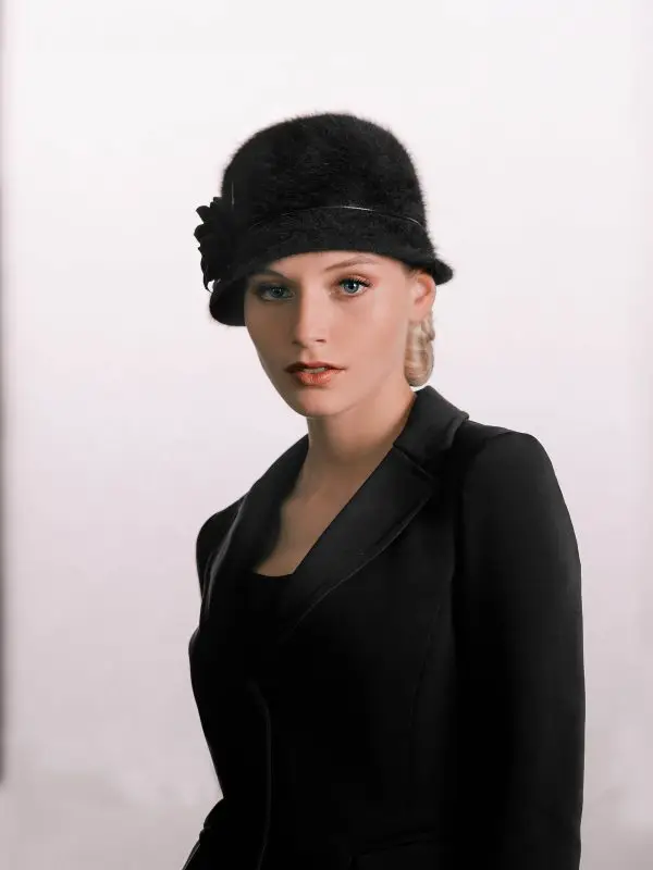 Woman wearing the black Angora bell by Maison Fabienne Delvigne