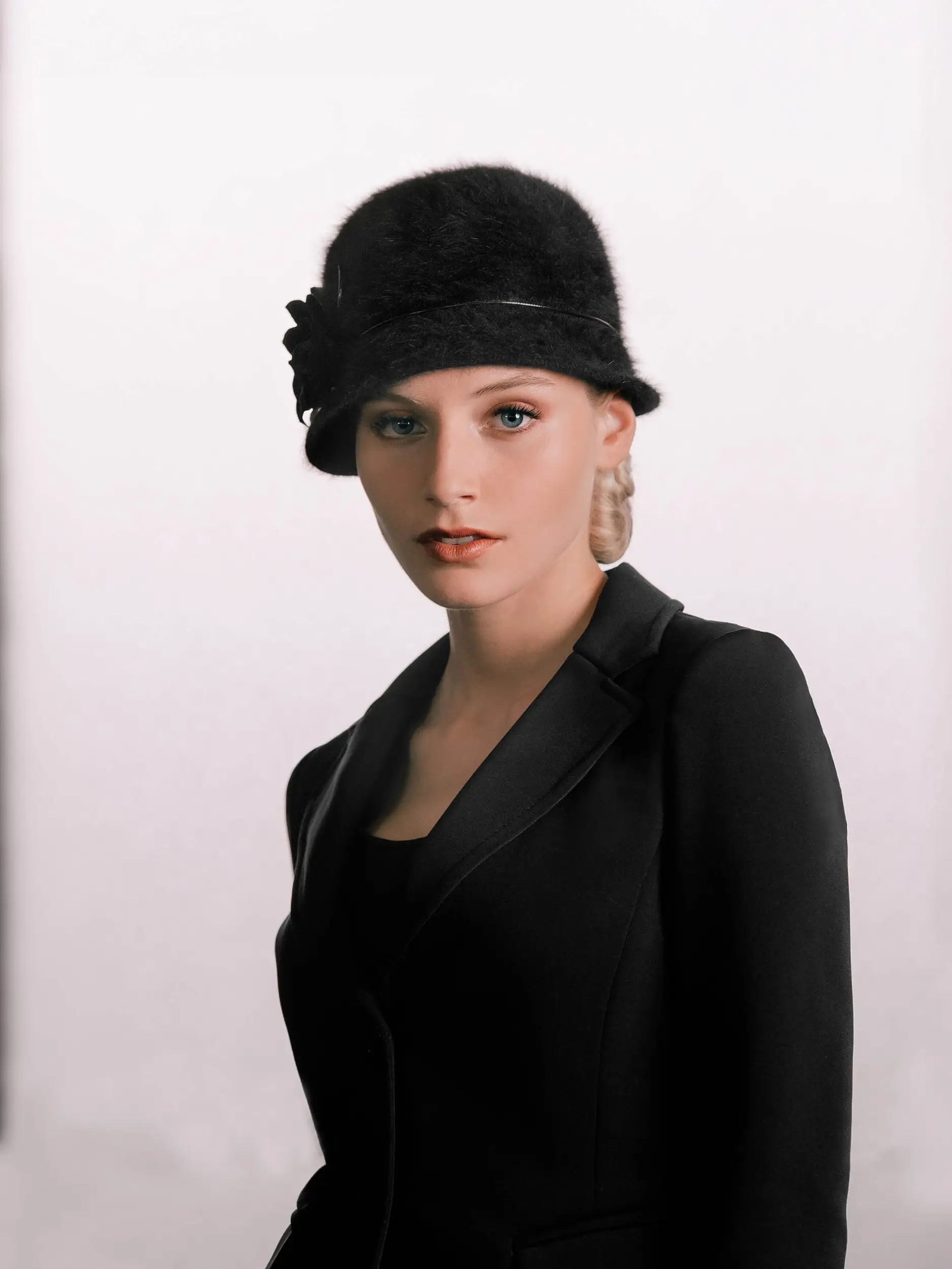 Woman wearing the black Angora bell by Maison Fabienne Delvigne
