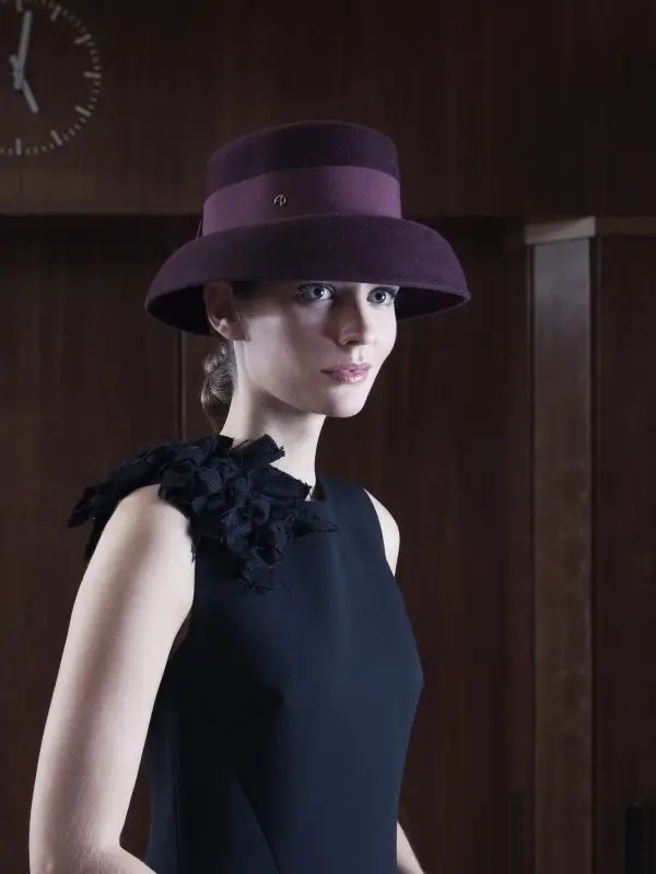 Model wearing the Little Hepburn Bordeaux felt hat in velvet