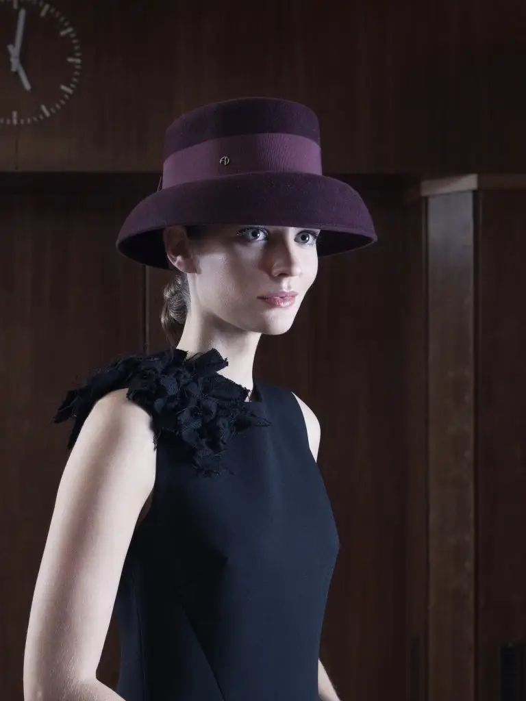Model wearing the Little Hepburn Bordeaux felt hat in velvet