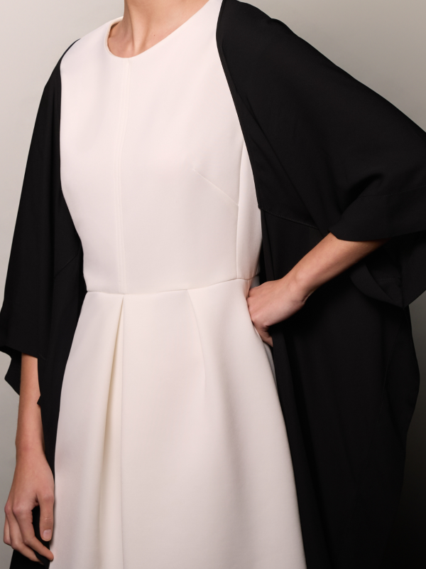 Mannequin wearing a black silk stole