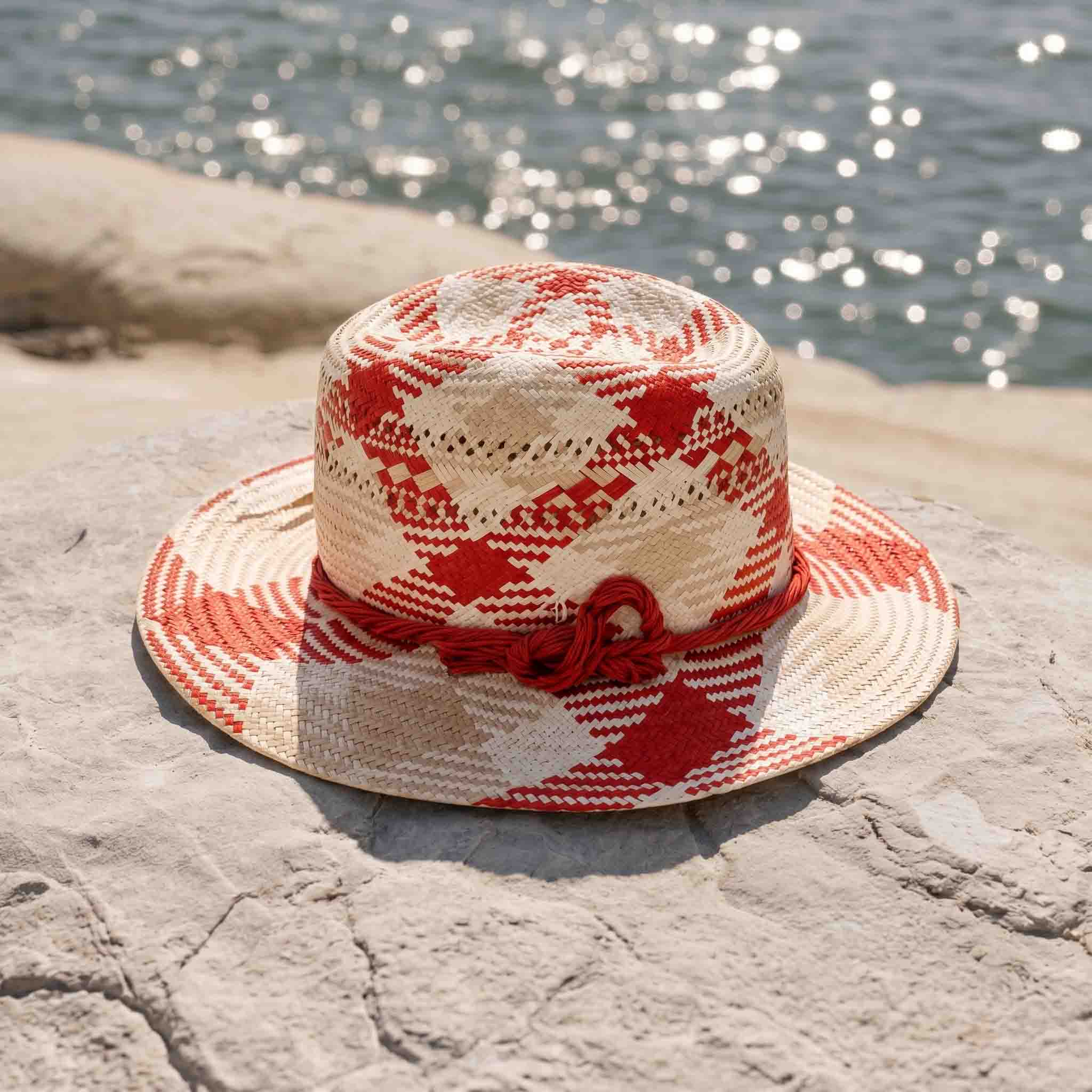 red fedora hat with a bow from Joye - Maison Fabienne Delvigne