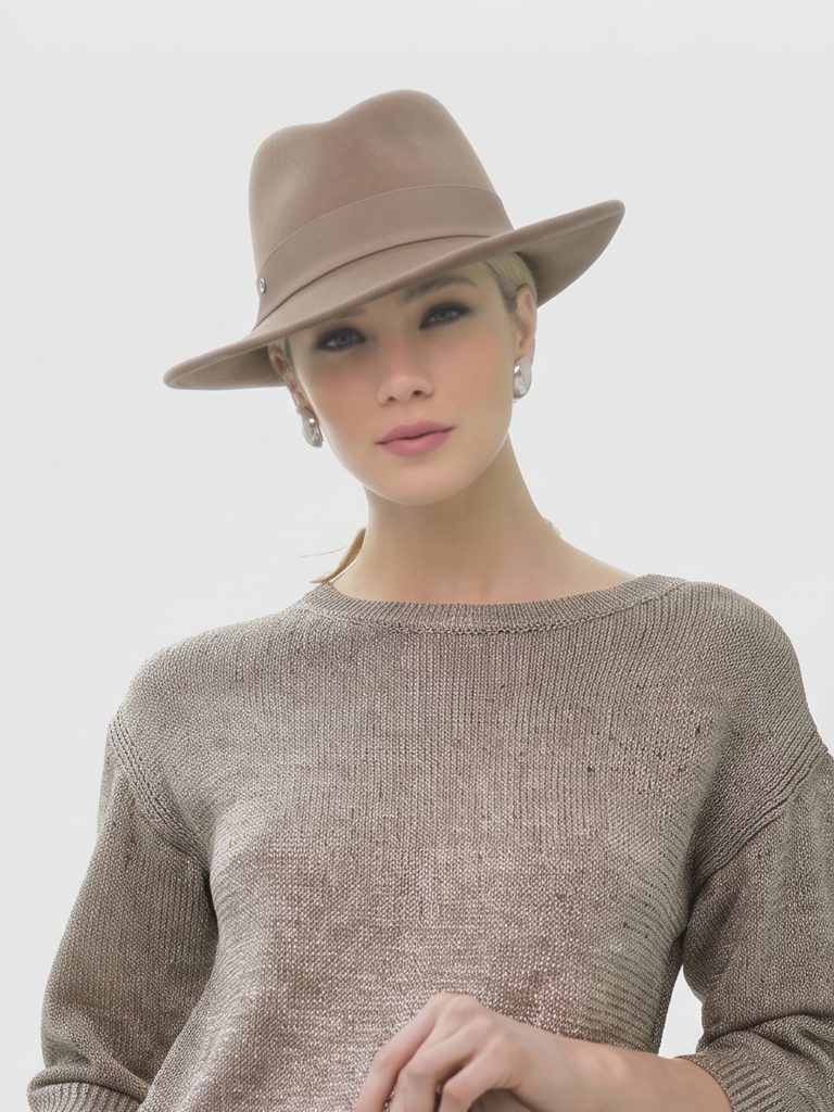 Model wearing the beige Leyla fedora hat